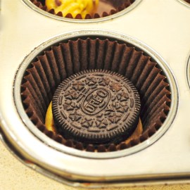 Press Oreo on top of cookie dough..