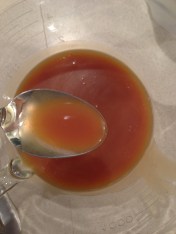 Making caramel cream- add cream and whisk.