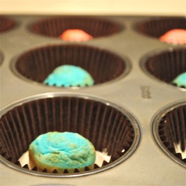 Set cake ball into center of cupcake...