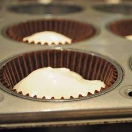 Scoop batter over top of cake ball.