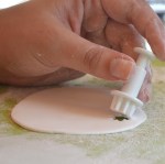 Cut daisies out of fondant