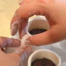 Add handle over seam, using water to attach it.